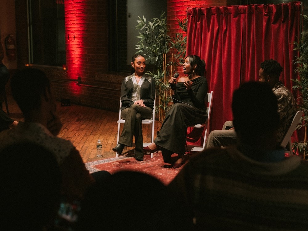 A stage conversation in front of the audience