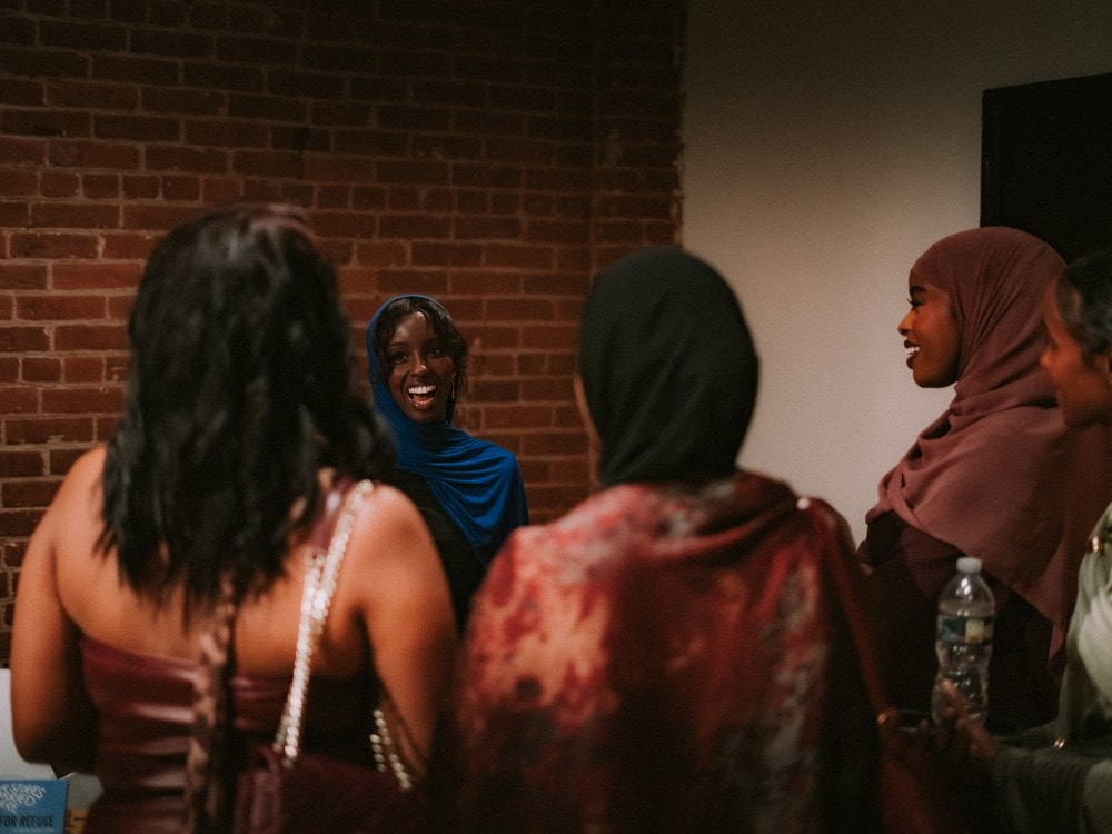 A group of attendees in conversation